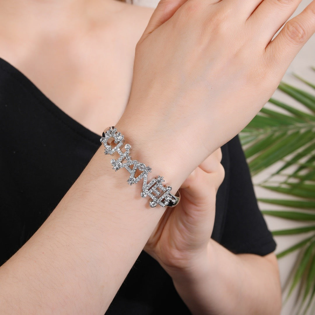 Signature Emblem Bangle in Polished Metal-Tone – Design 030 front product view