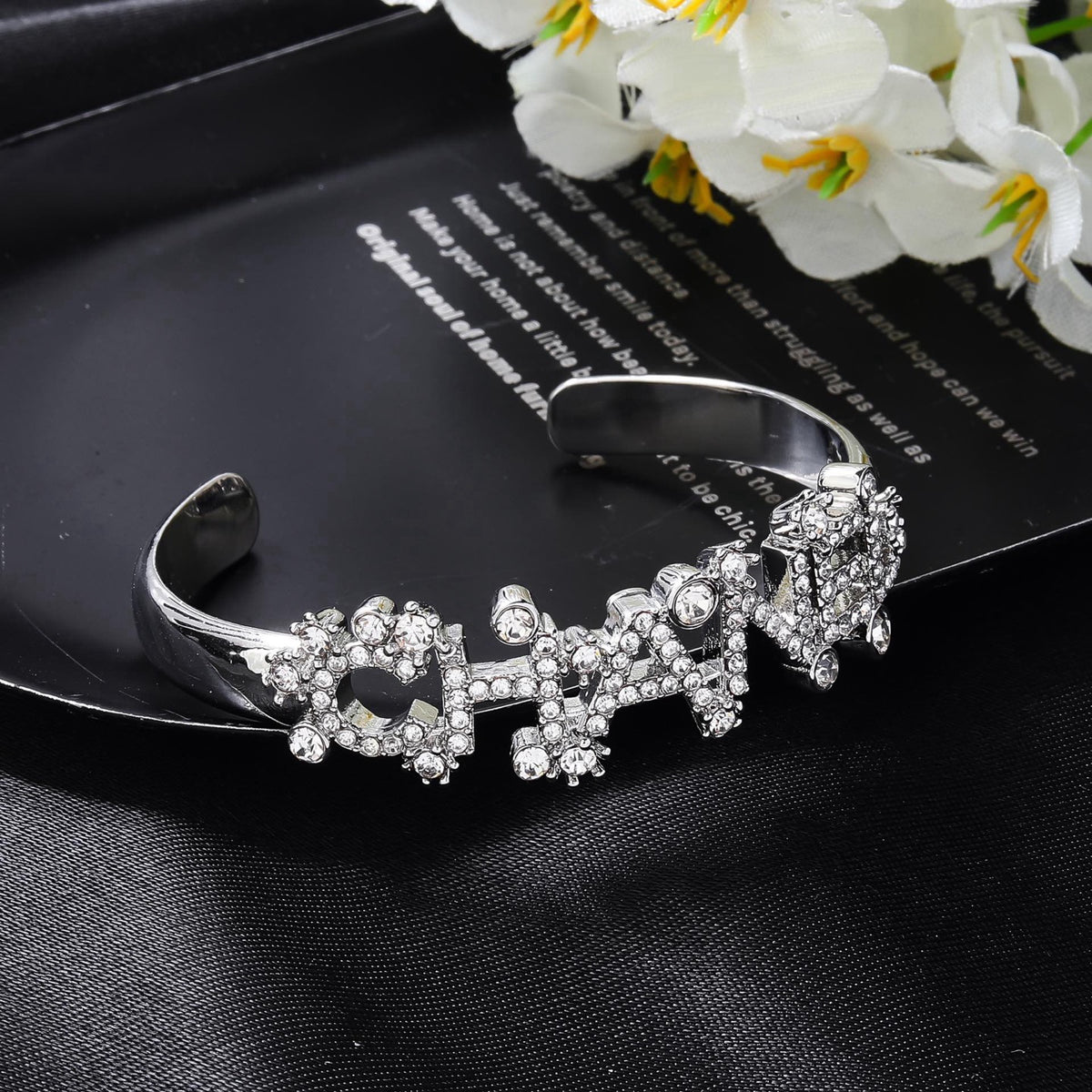 Signature Emblem Bangle in Polished Metal-Tone – Design 030 detail view