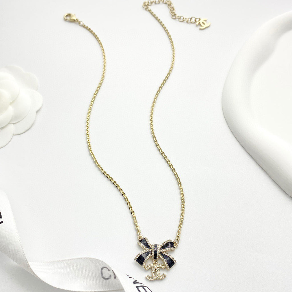 Bow Pendant Necklace in Black-Tone front product view