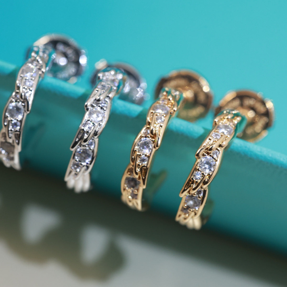 Signature Motif Stud Earrings in Polished Metal-Tone – Design 02 front product view