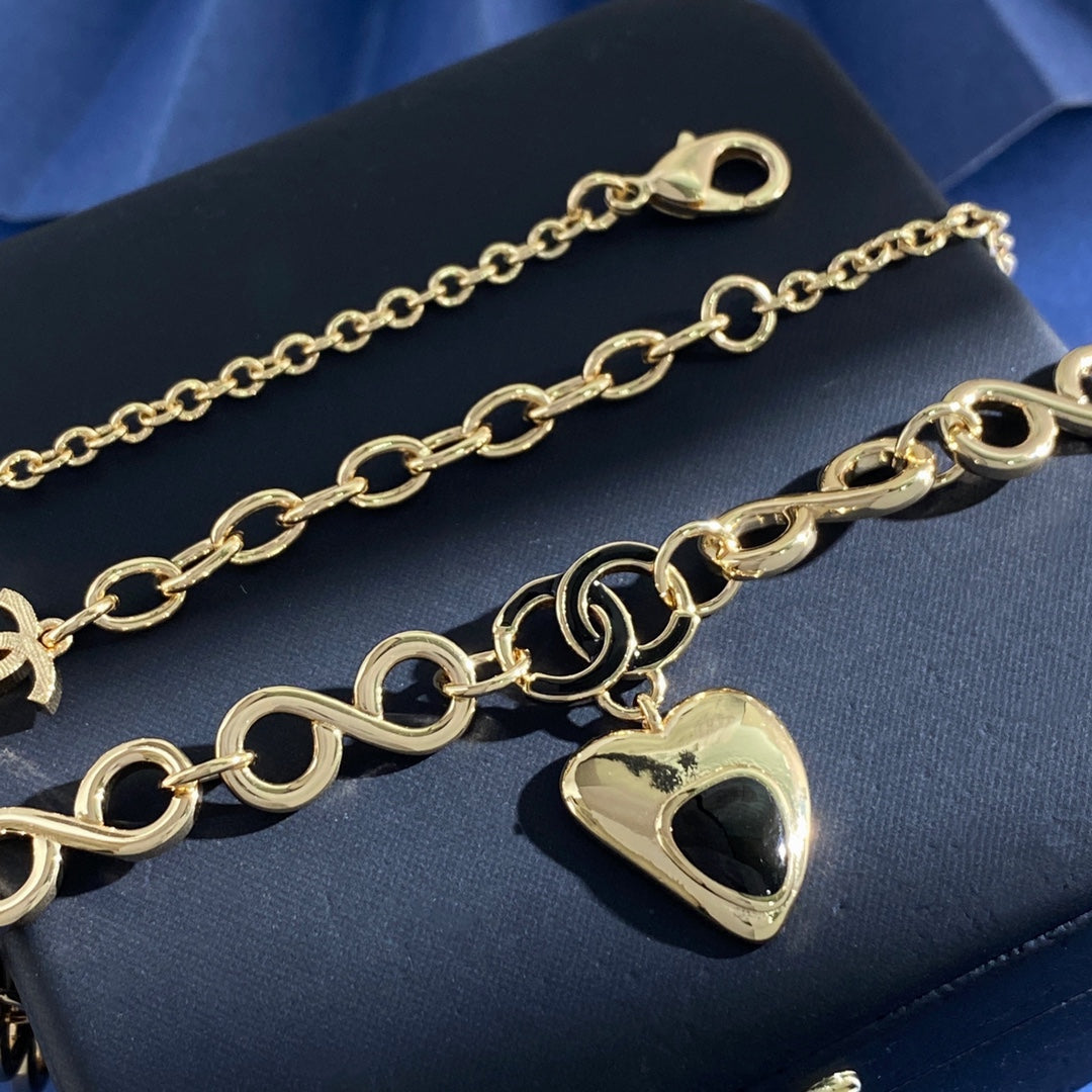 Double-C Emblem Pendant Necklace in Gold-Tone – Heart Detail – Design 002 detail view