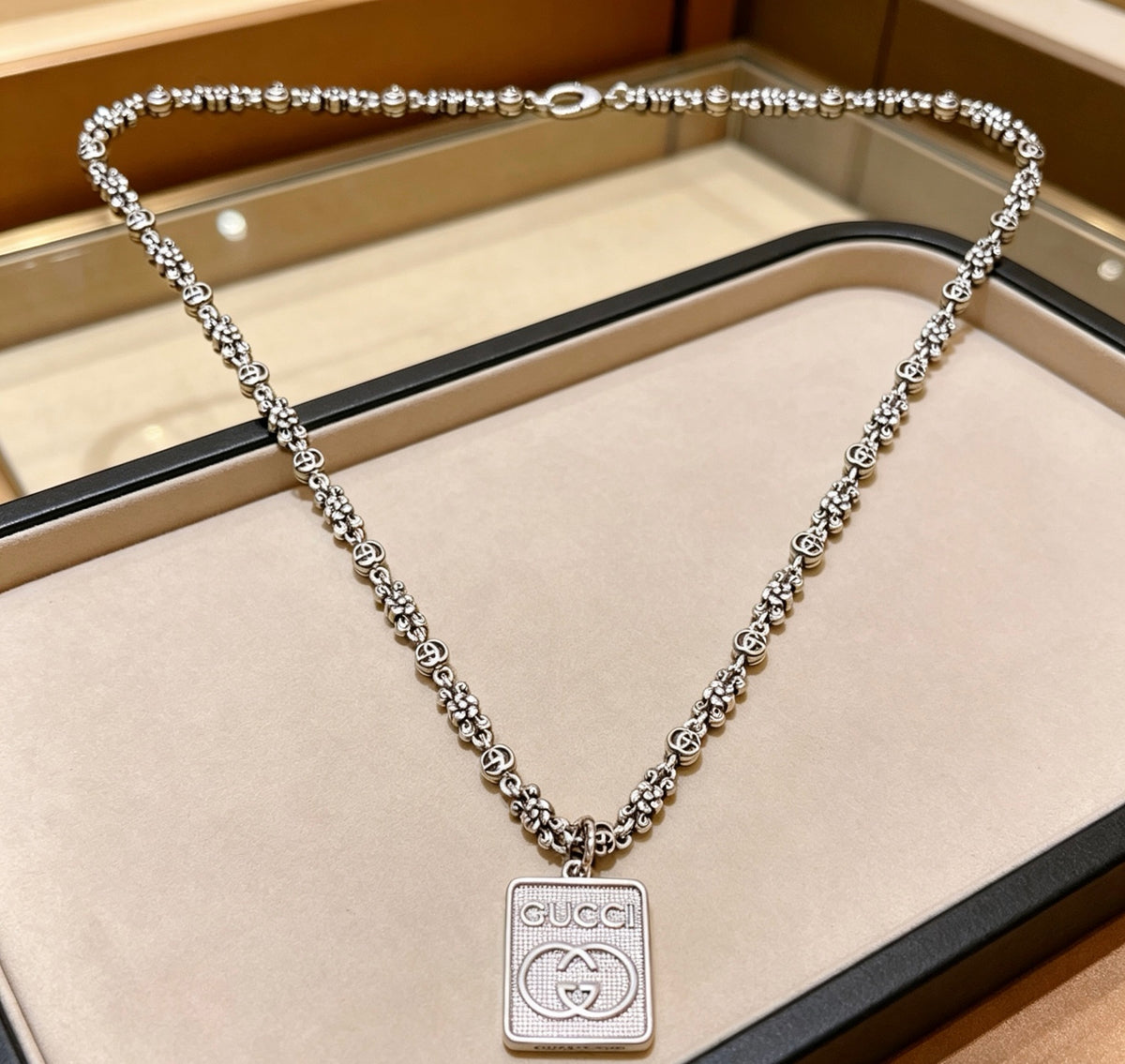 Double-G Emblem Pendant Necklace in Polished Metal-Tone – Vintage Detail – Design 050 side detail