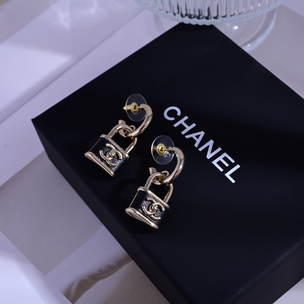 Signature Emblem Stud Earrings in Polished Metal-Tone – Design 086 front product view