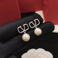 Signature Emblem Pearl-Detail Stud Earrings – Design 04 main product view