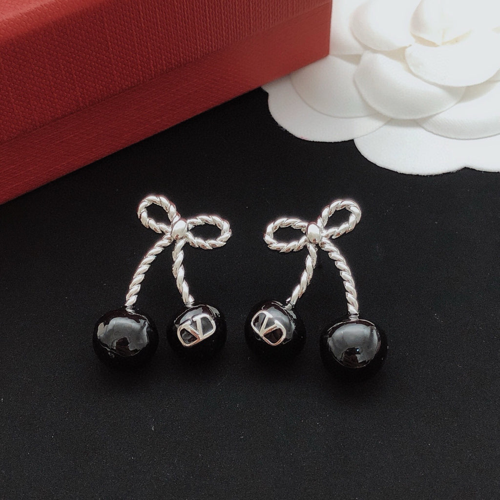 Bow Stud Earrings in Gold-Tone detail view