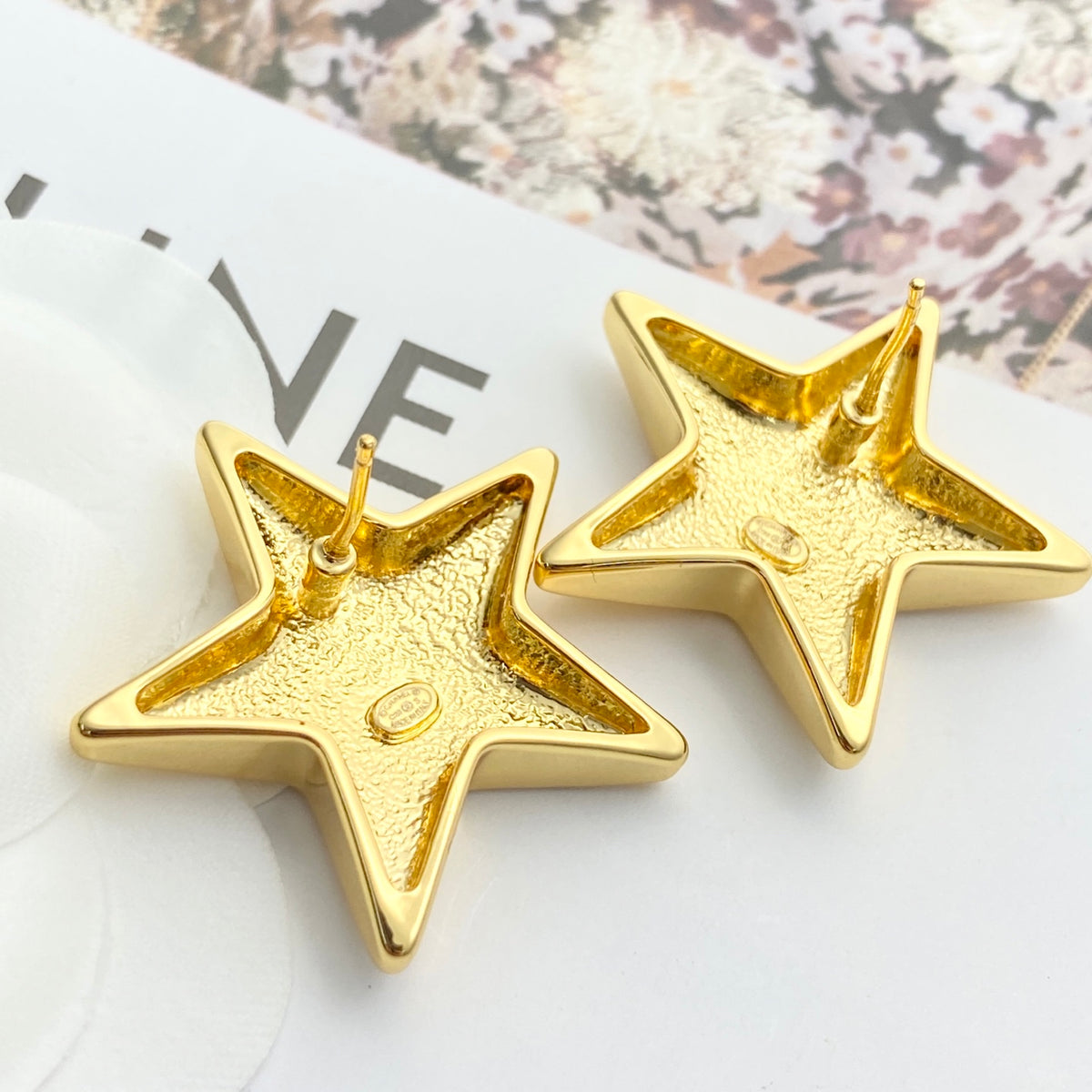 Double-C Emblem Stud Earrings in Gold-Tone – Star Detail – Design 007 side detail
