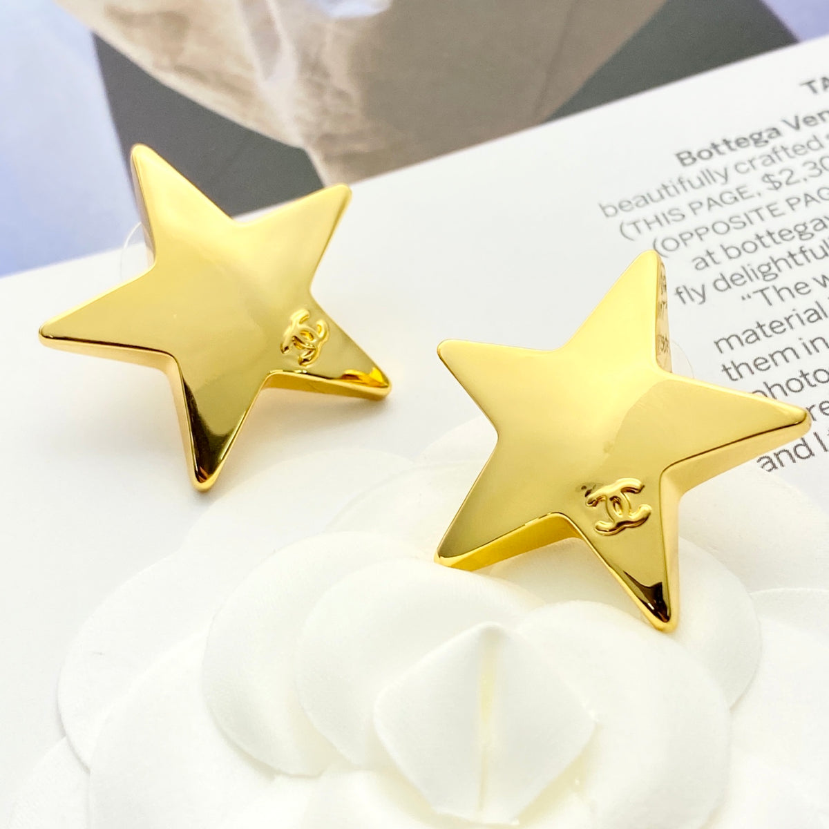 Double-C Emblem Stud Earrings in Gold-Tone – Star Detail – Design 007 detail view