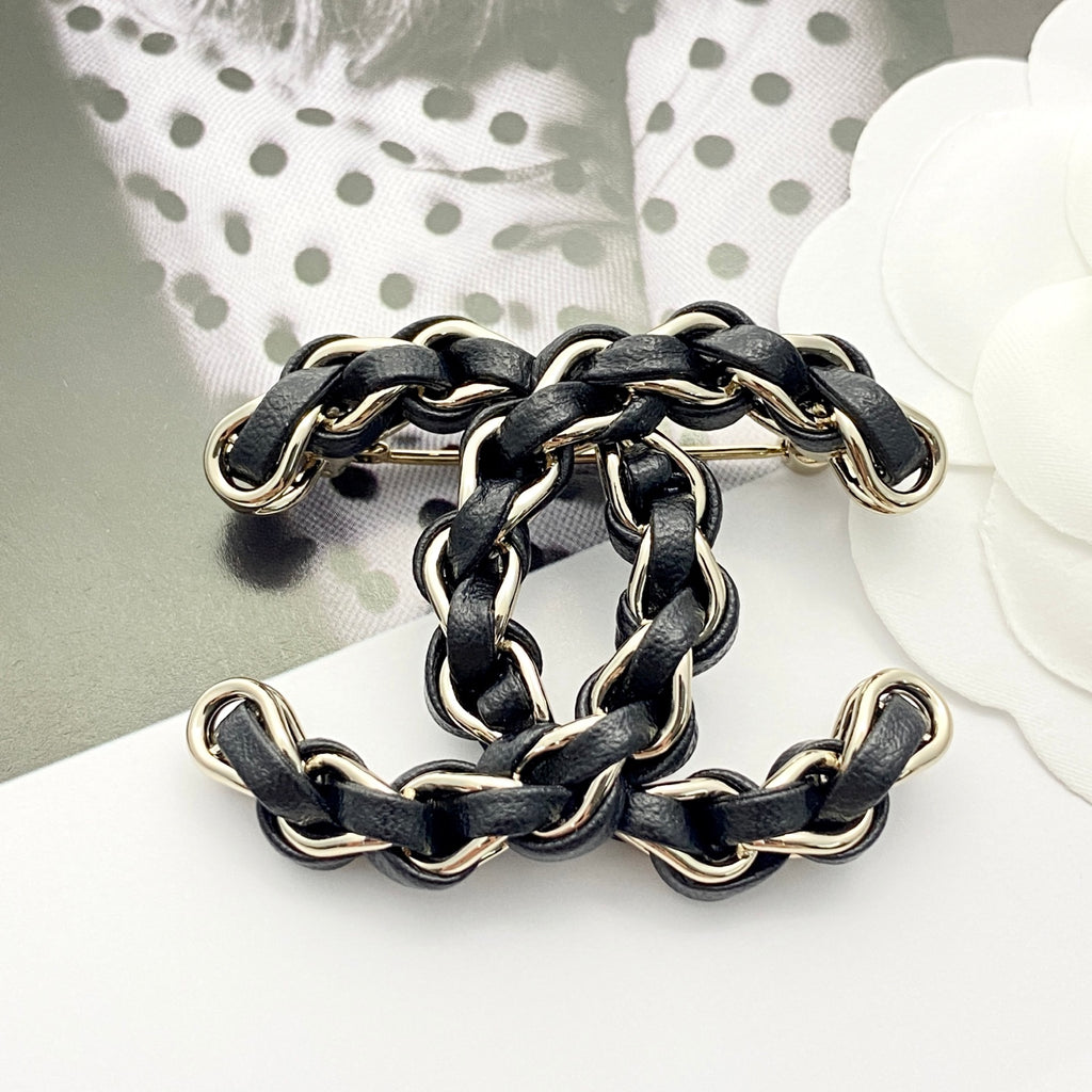 Signature Emblem Brooch in Polished Metal-Tone – Black Detail – Design 003 styled product view