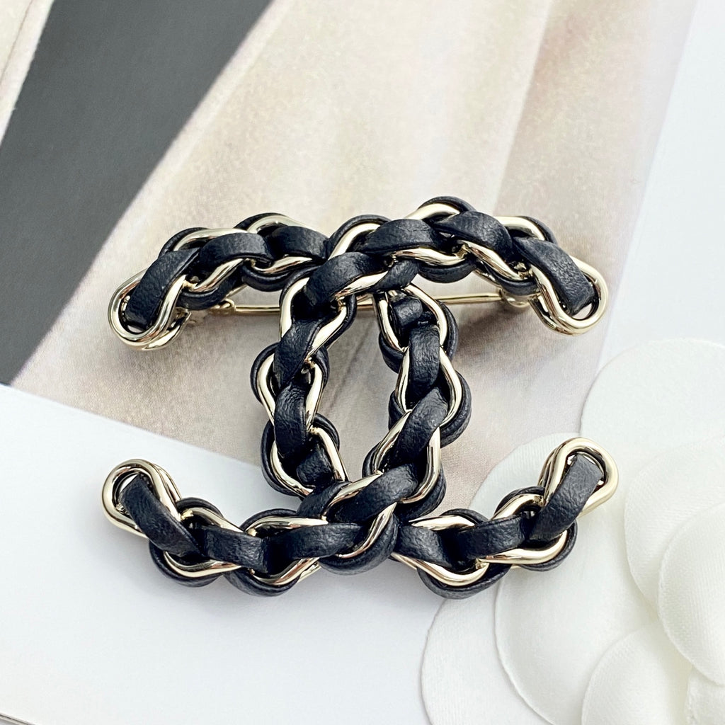 Signature Emblem Brooch in Polished Metal-Tone – Black Detail – Design 003 main product view