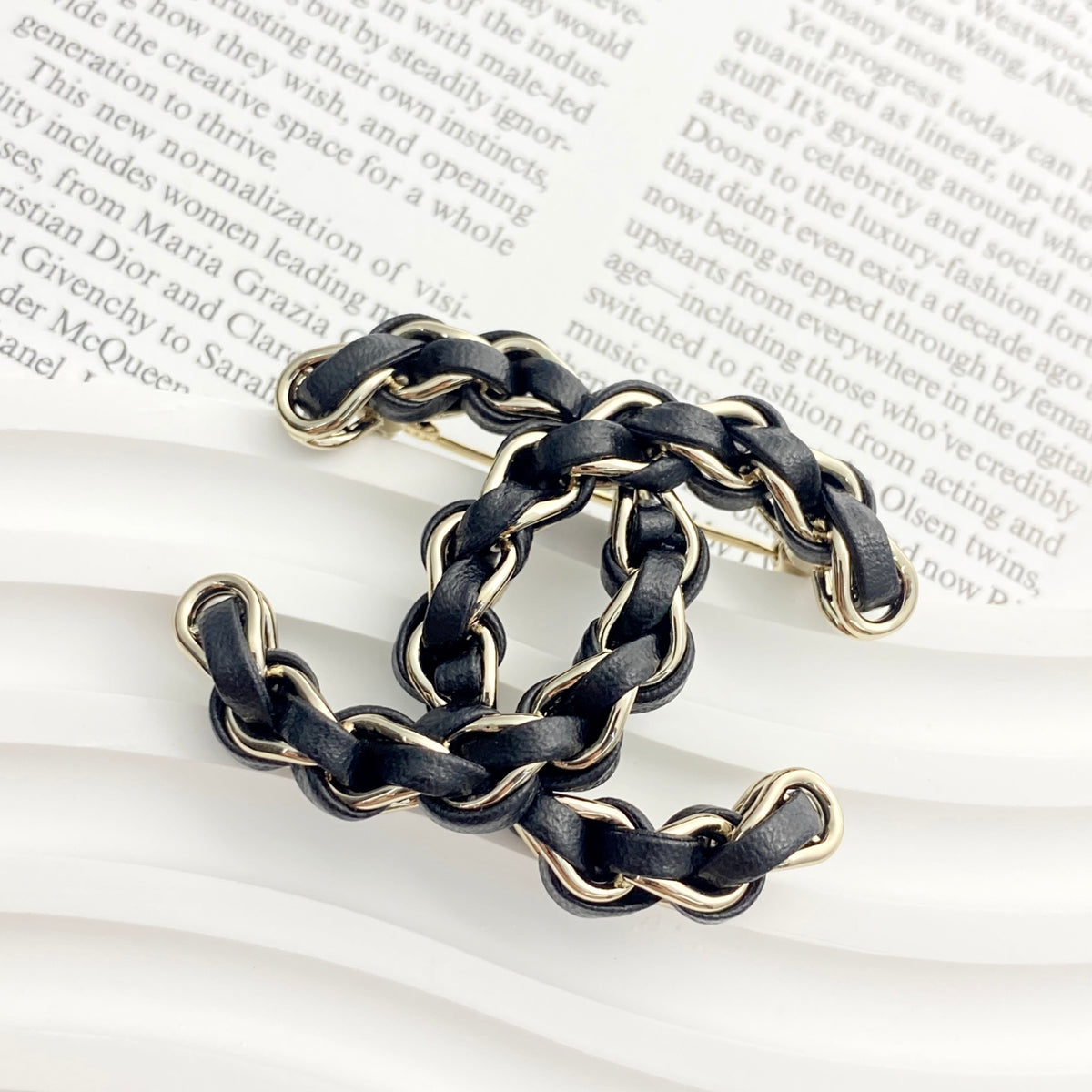 Signature Emblem Brooch in Polished Metal-Tone – Black Detail – Design 003 main product view