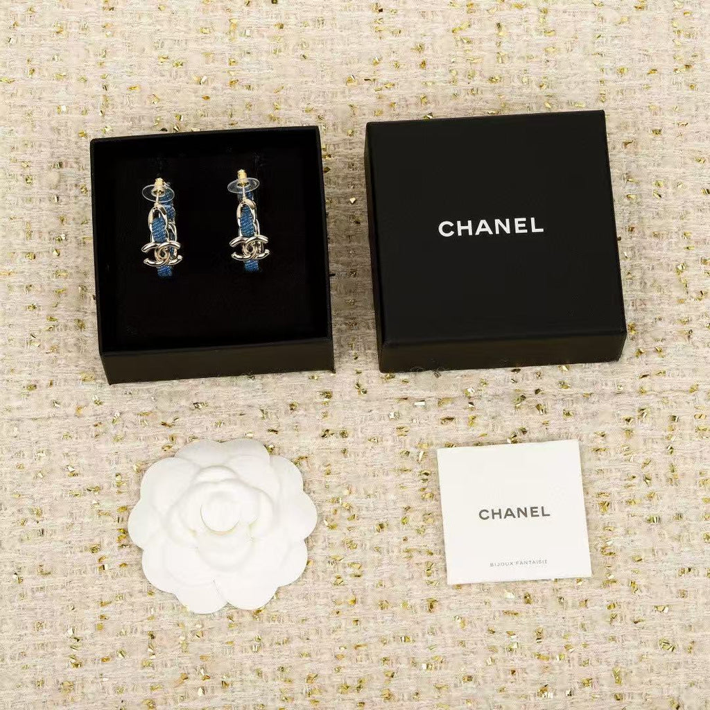 Signature Emblem Crystal-Accent Stud Earrings – Blue Detail styled product view