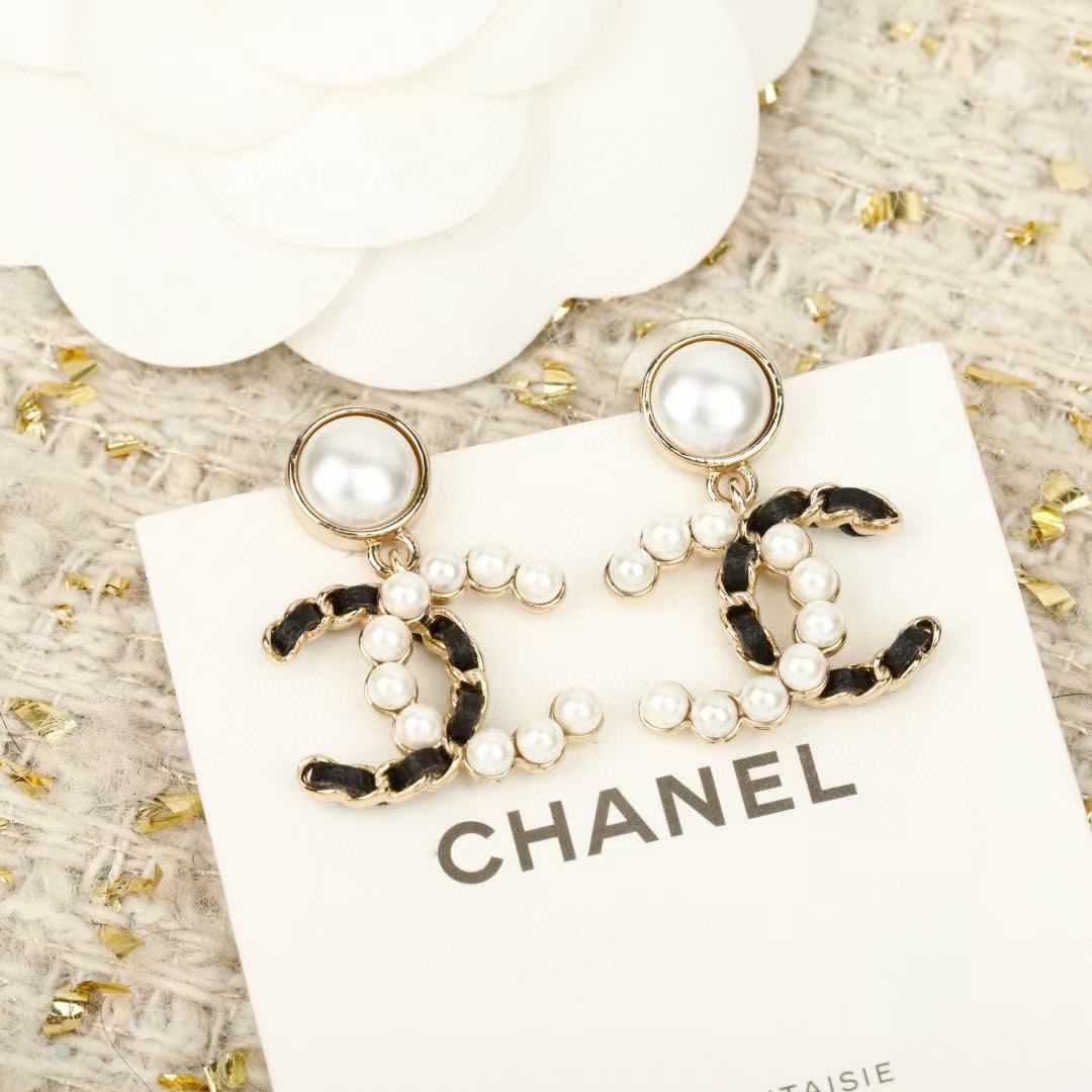 Signature Emblem Crystal-Accent Stud Earrings – Red Detail – Design 005 close-up detail