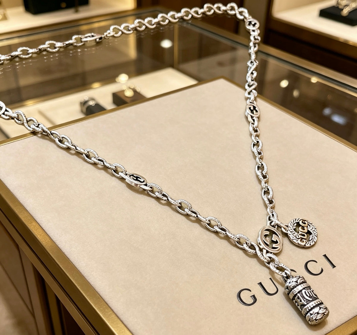 Double-G Emblem Pendant Necklace in Polished Metal-Tone – Vintage Detail – Design 052 main product view
