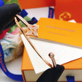 Geometric Emblem Bangle in Rose-Gold-Tone – Rose Gold Detail main product view