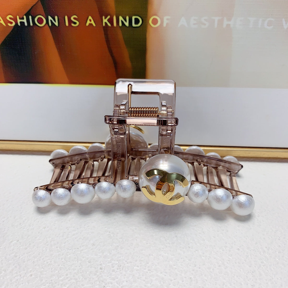 Geometric Emblem Jewelry Accessory in Polished Metal-Tone front product view