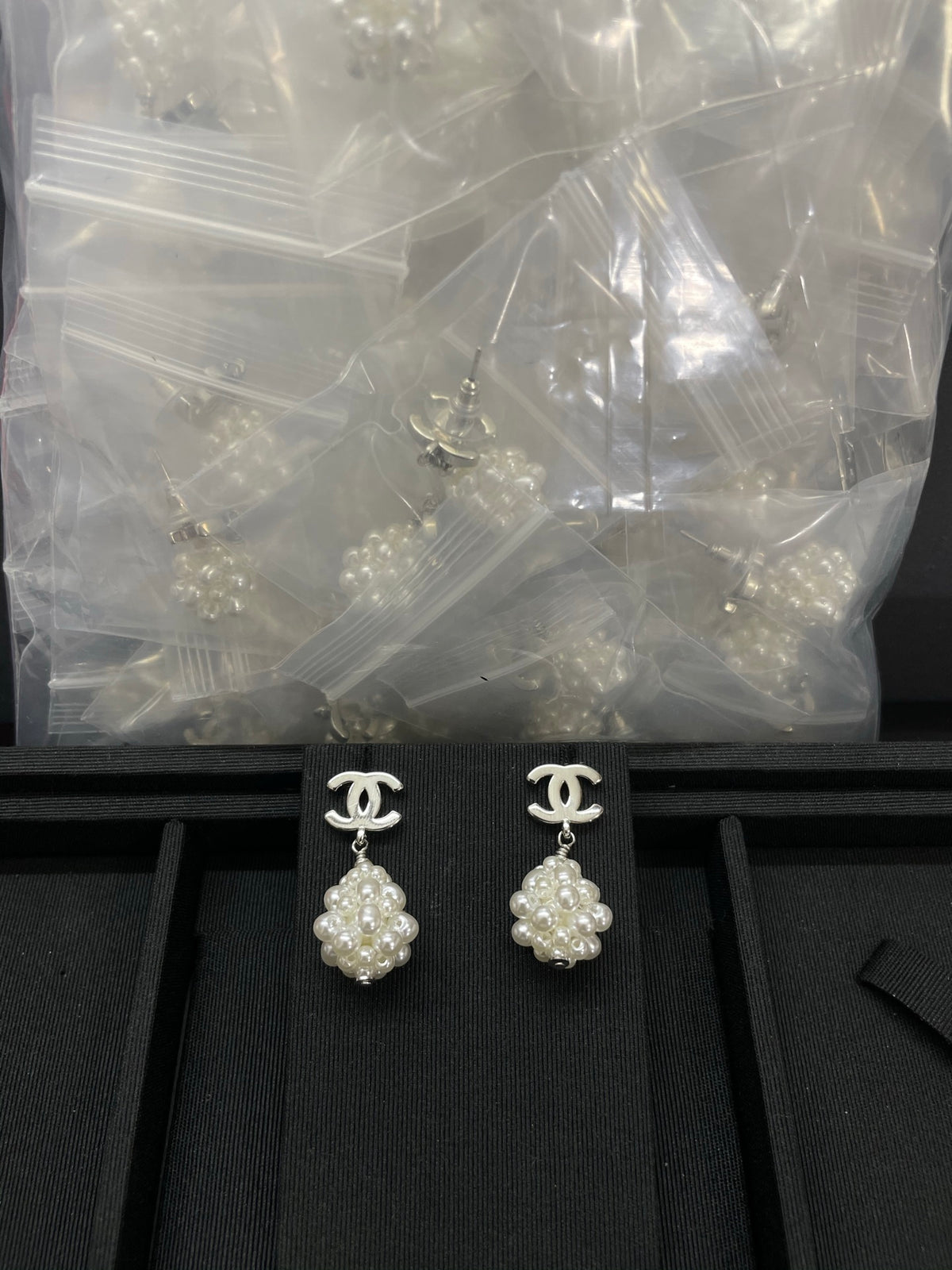 Double-C Emblem Pearl-Detail Statement Earrings – Pearl Detail – Design 024 close-up detail