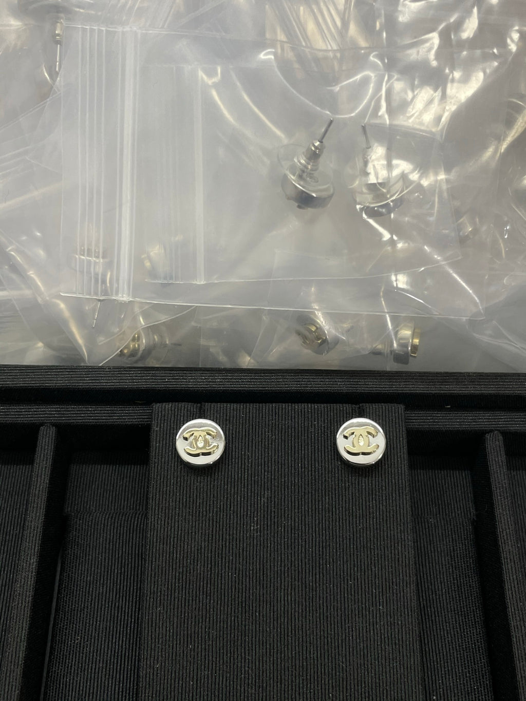 Double-C Emblem Stud Earrings in Polished Metal-Tone – Design 324 front product view