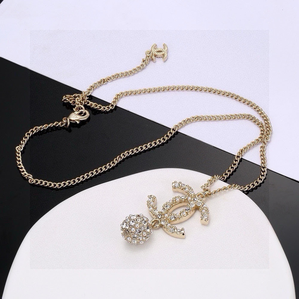 Double-C Emblem Pearl-Detail Pendant Necklace – Pearl Detail – Design 097 detail view