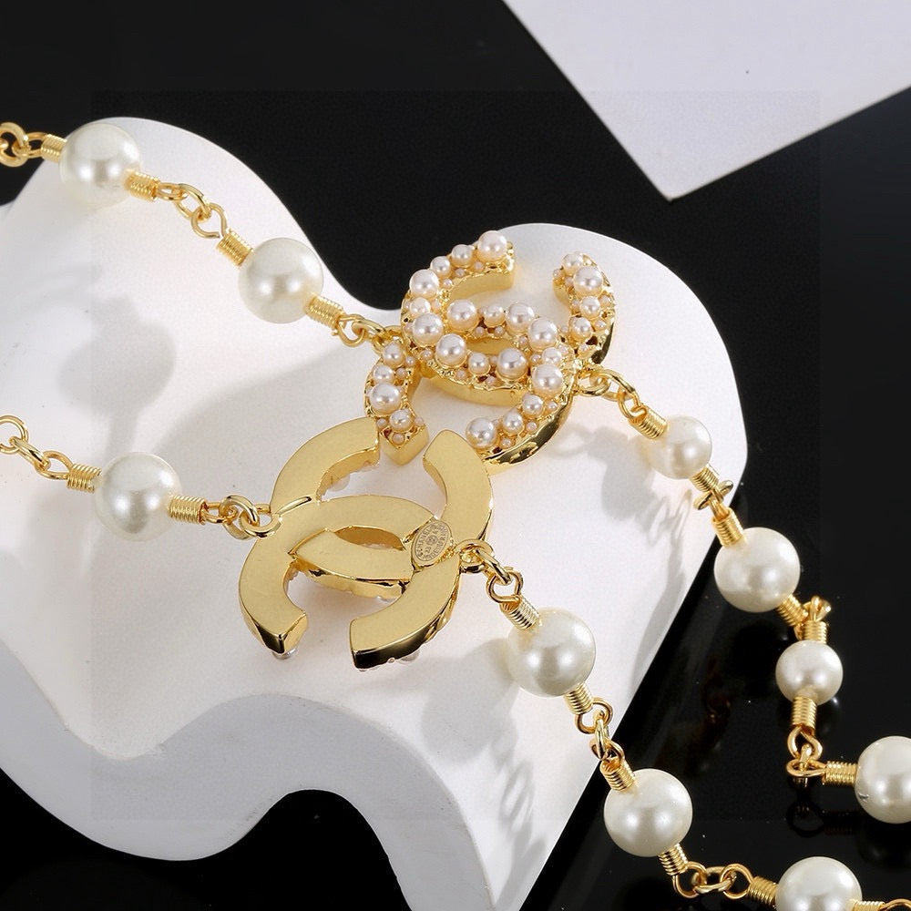 Double-C Emblem Pearl-Detail Pendant Necklace – Pearl Detail – Design 096 styled product view