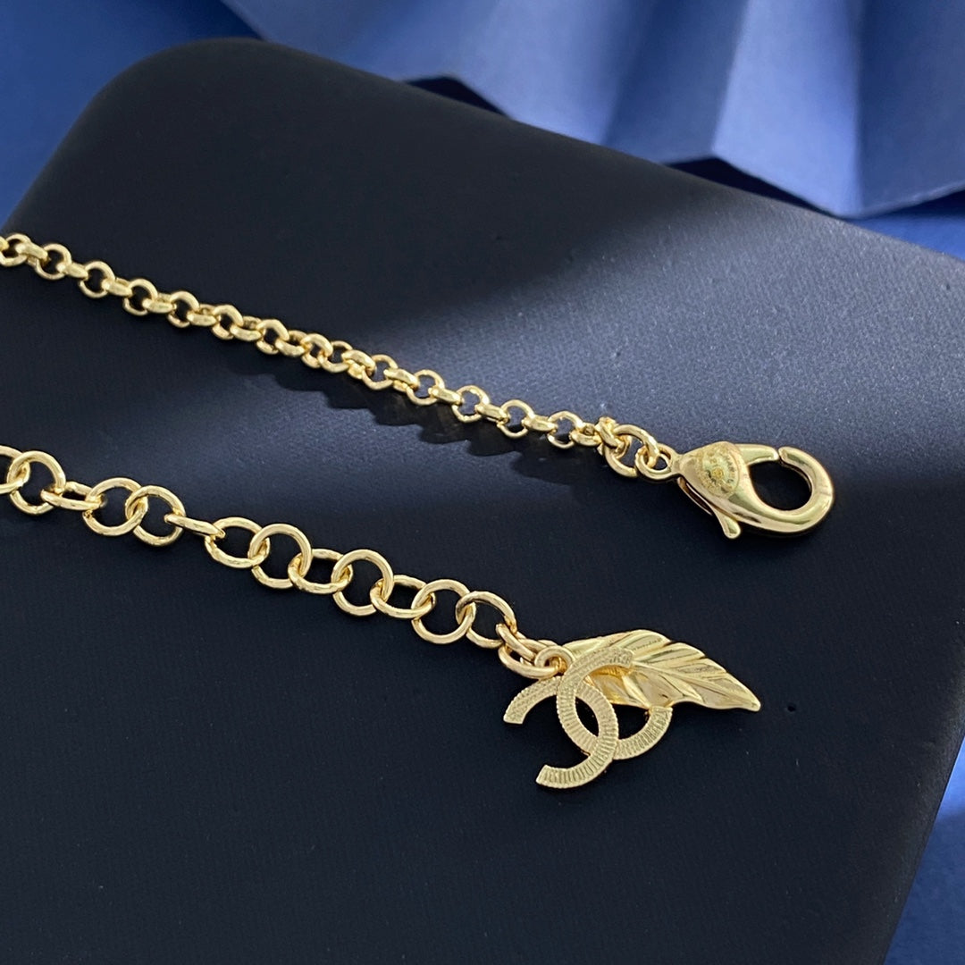 Double-C Emblem Crystal-Accent Pendant Necklace – Pink Detail – Design 003 detail view