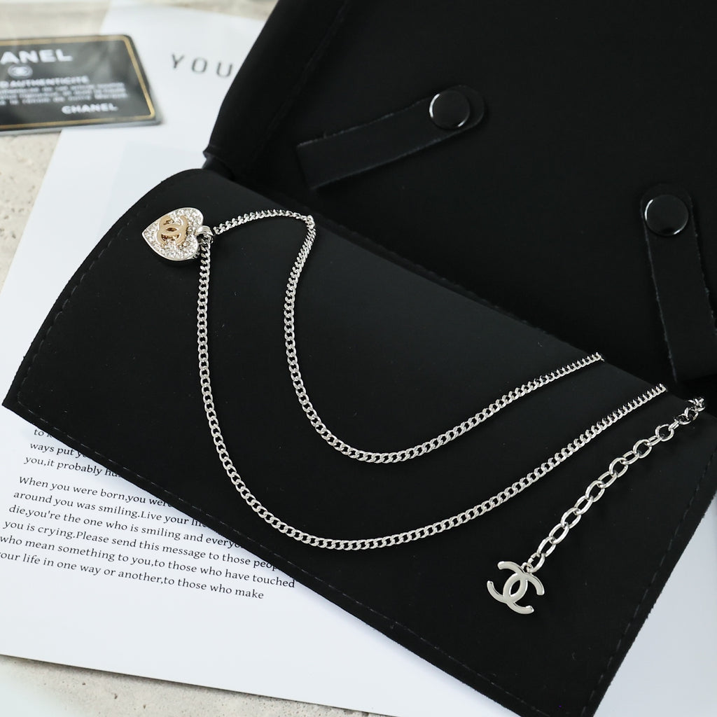 Double-C Emblem Crystal-Accent Pendant Necklace – Heart Detail – Design 007 close-up detail