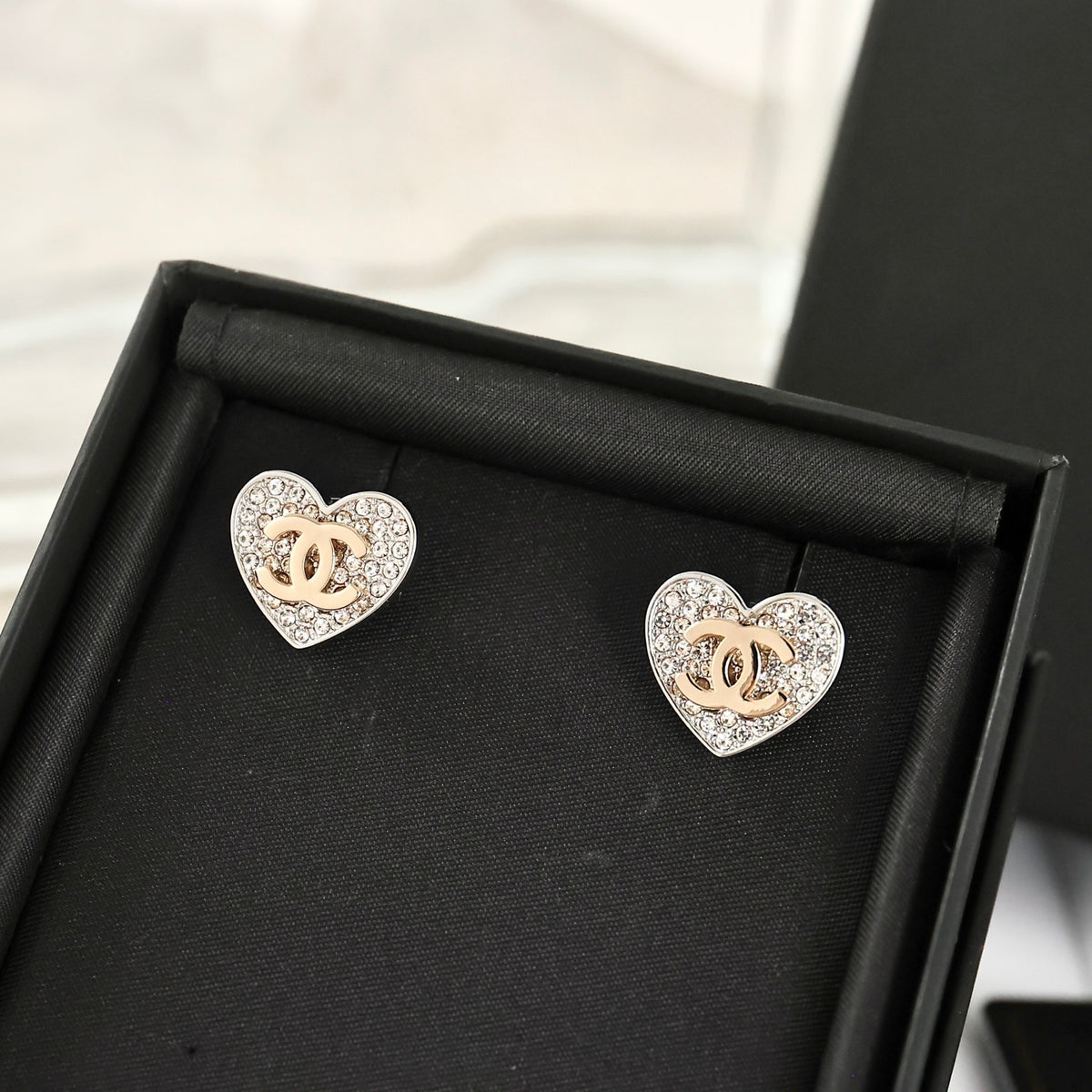 Double-C Emblem Crystal-Accent Stud Earrings – Heart Detail – Design 005 side detail
