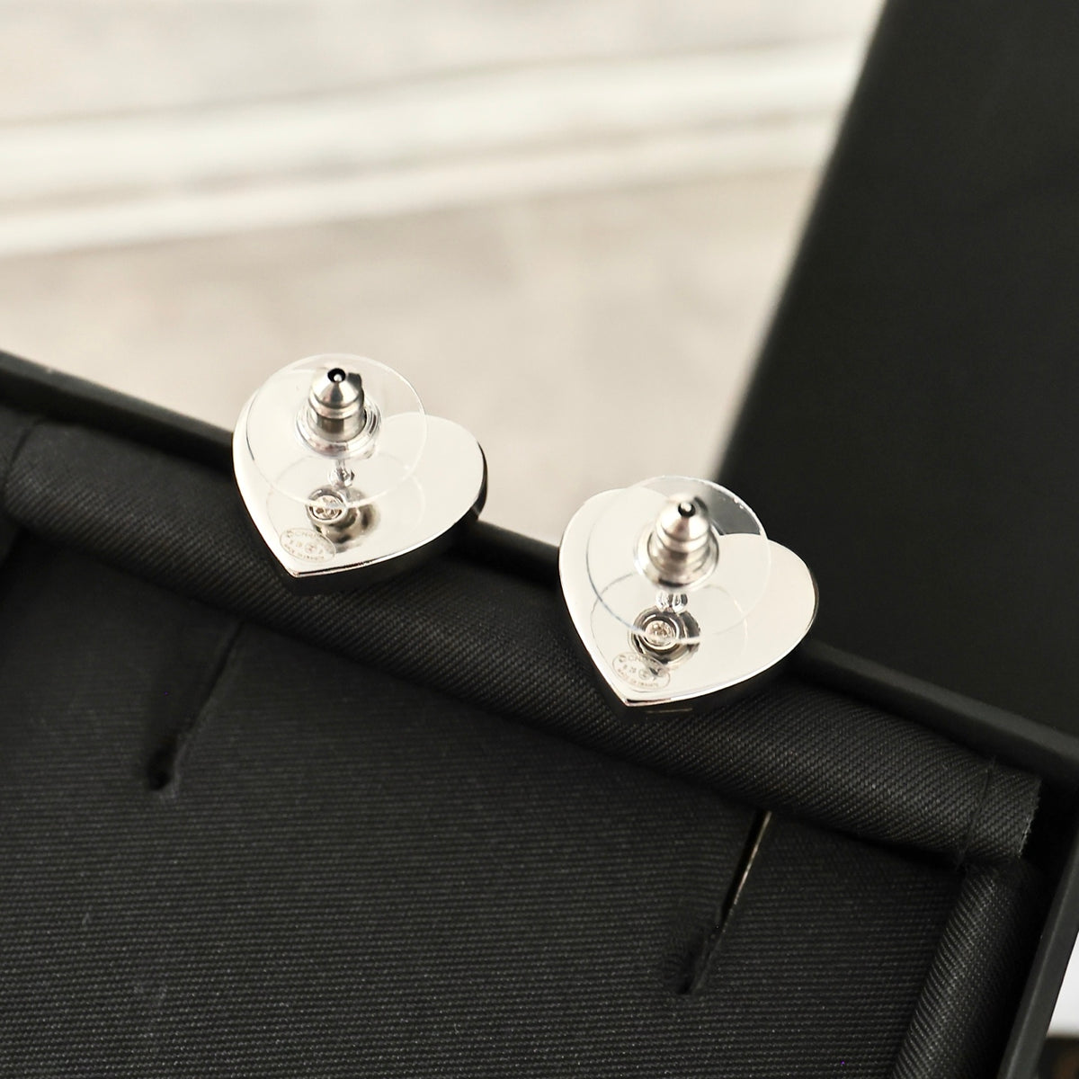 Double-C Emblem Crystal-Accent Stud Earrings – Heart Detail – Design 004 detail view
