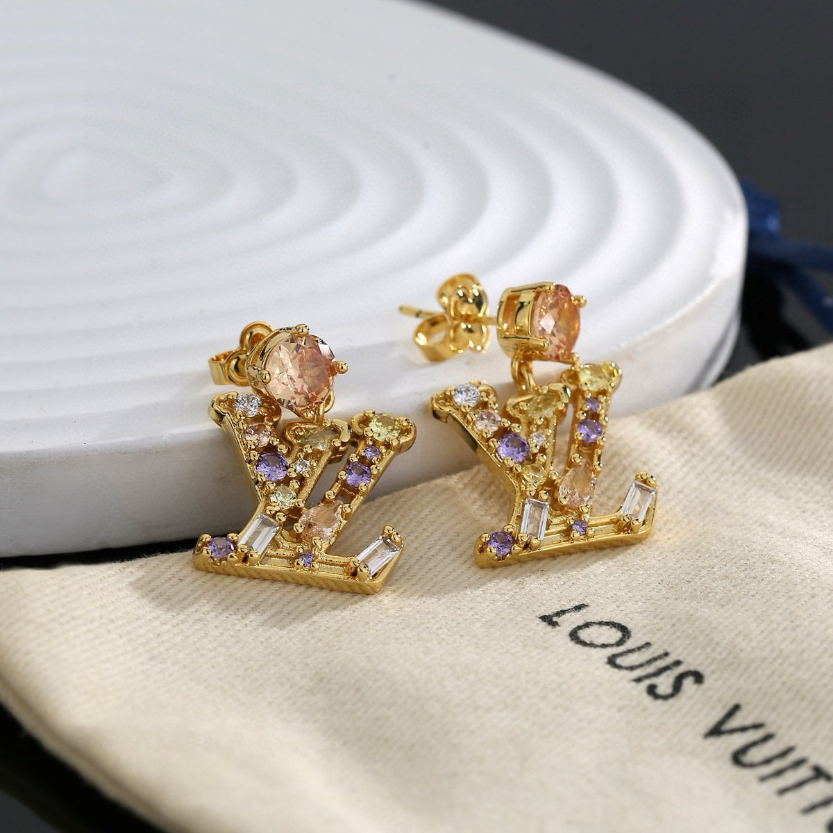 Letter Emblem Stud Earrings in Polished Metal-Tone – Design 006 close-up detail