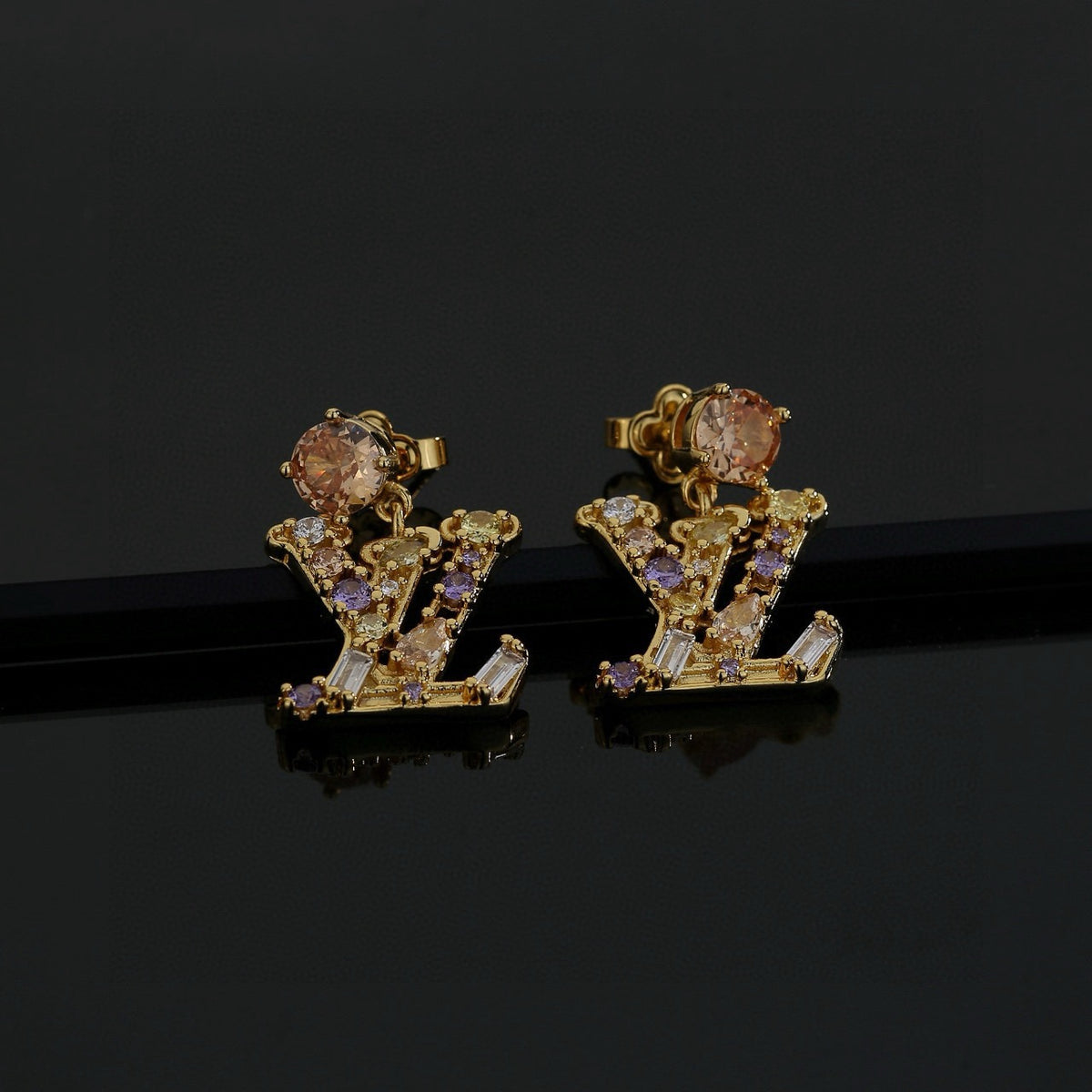 Letter Emblem Stud Earrings in Polished Metal-Tone – Design 034 detail view