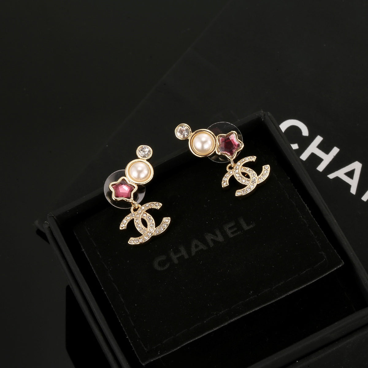 Double-C Emblem Stud Earrings in Gold-Tone – Star Detail – Design 008 main product view
