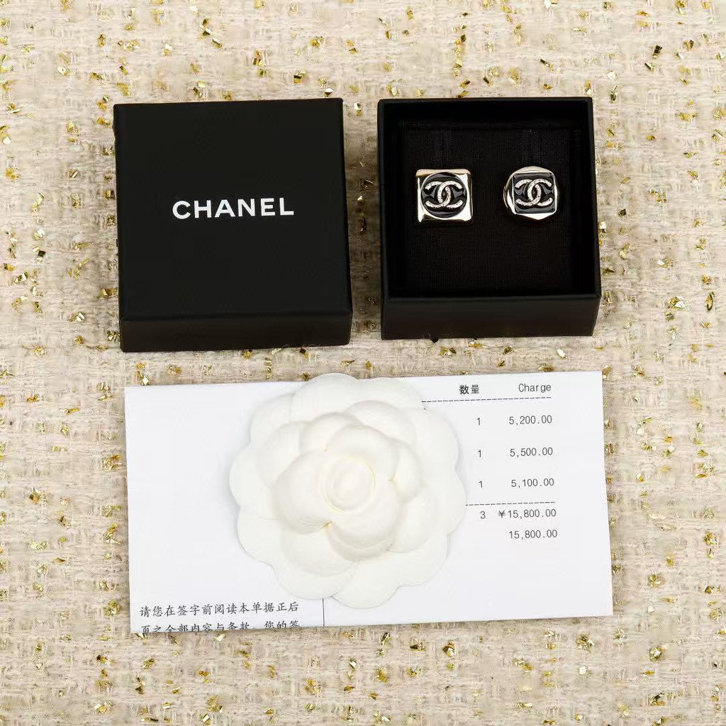 Double-C Emblem Stud Earrings in Polished Metal-Tone – Design 351 detail view