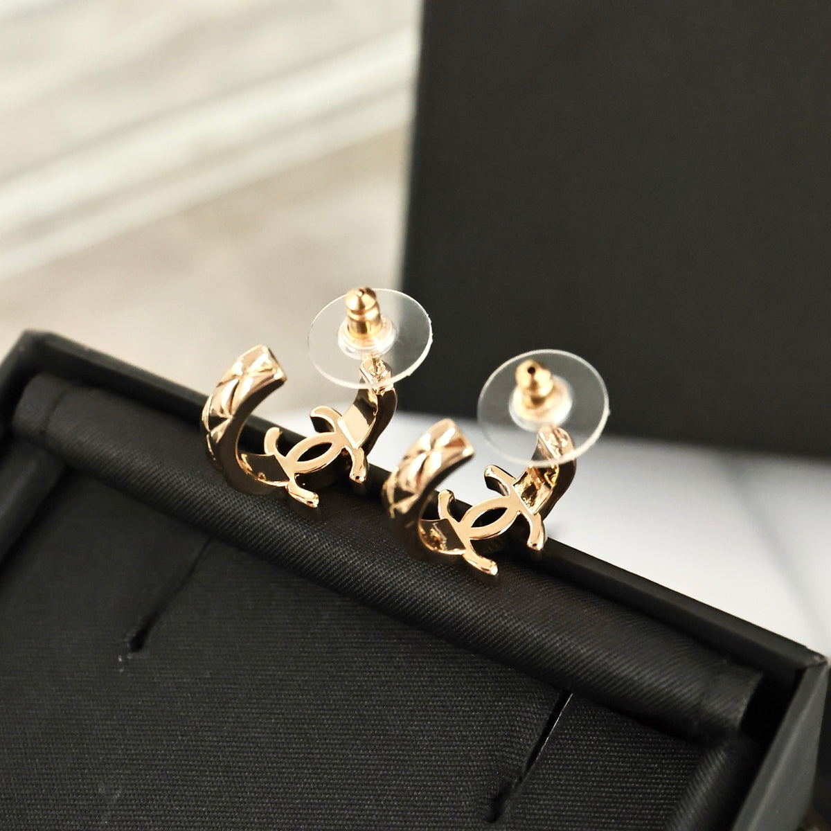 Double-C Emblem Statement Earrings in Polished Metal-Tone – Design 049 side detail