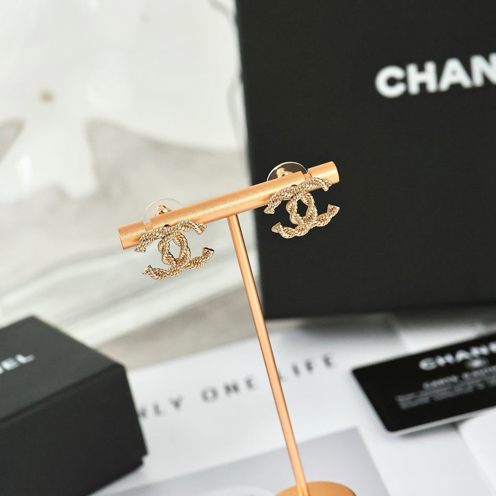 Double-C Emblem Stud Earrings in Polished Metal-Tone – Design 325 front product view