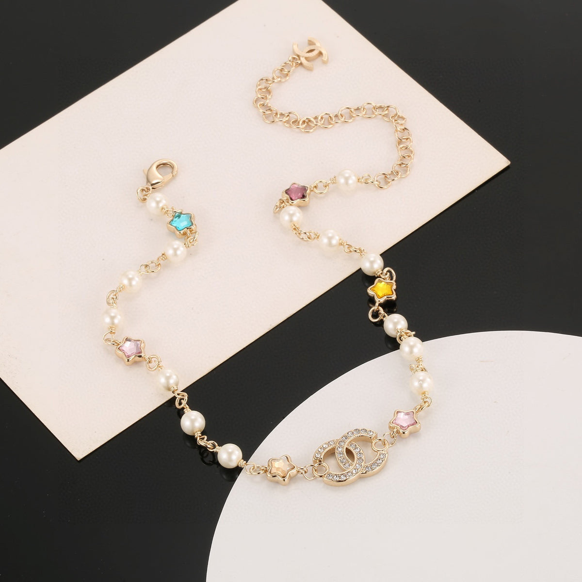 Double-C Emblem Pearl-Detail Pendant Necklace – Pearl Detail – Design 038 styled product view