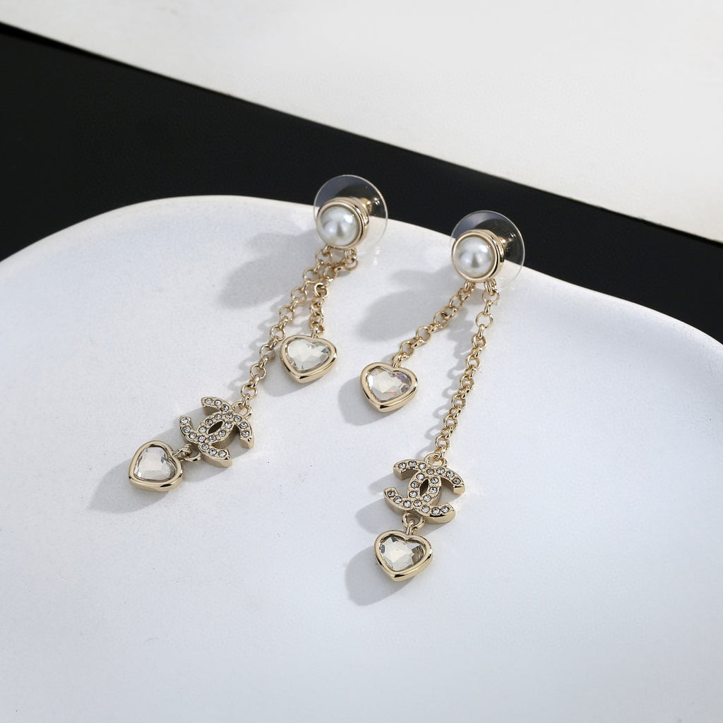 Signature Emblem Stud Earrings in Gold-Tone – Design 056 close-up detail