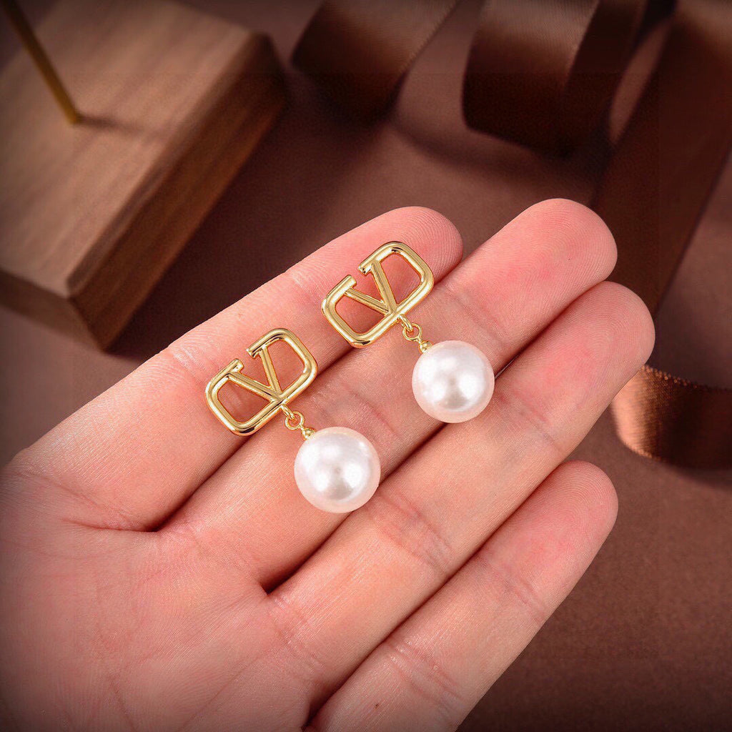 Signature Emblem Stud Earrings in Gold-Tone – Design 17 styled detail