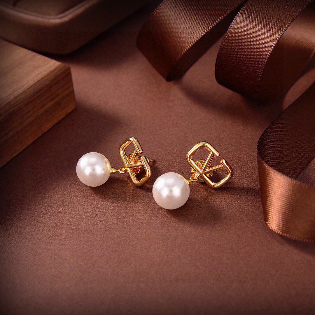 Signature Emblem Stud Earrings in Gold-Tone – Design 17 close-up view