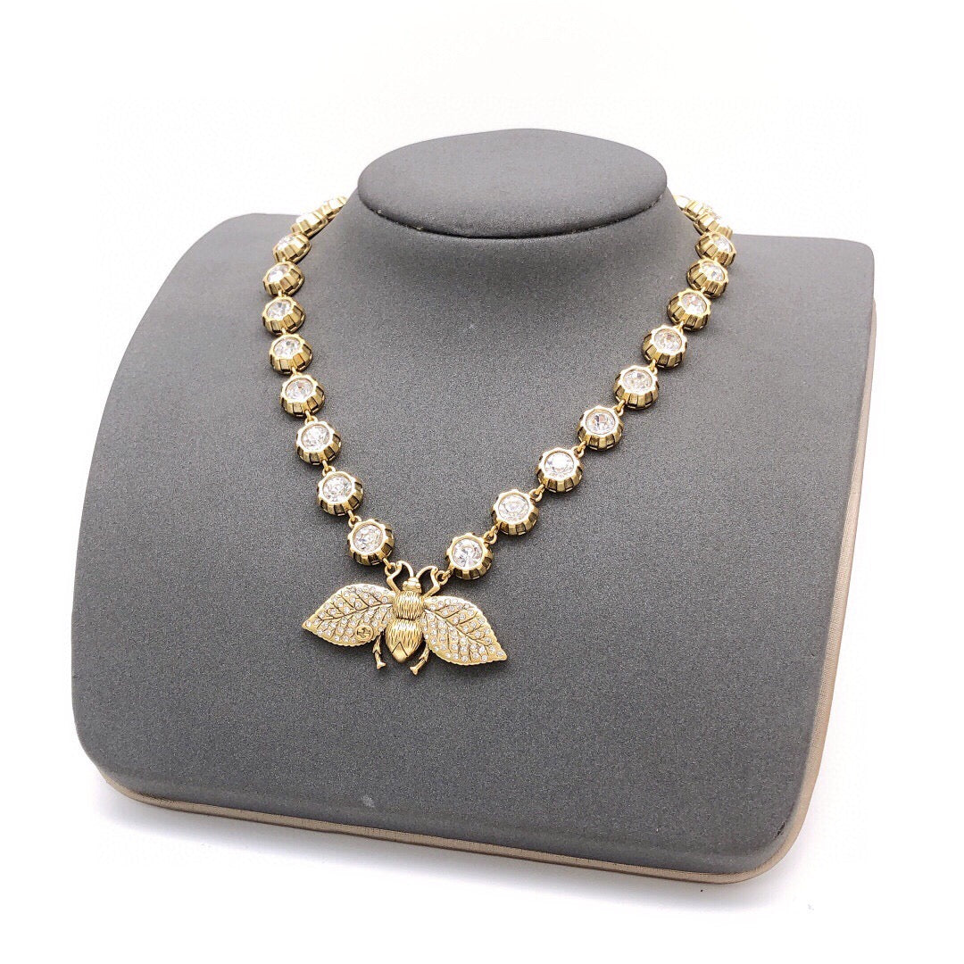 Bee Pendant Necklace in Polished Metal-Tone side detail