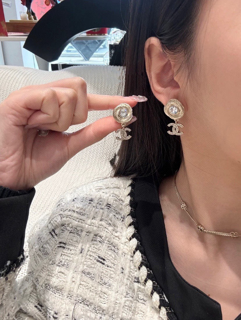 Double-C Emblem Stud Earrings in Gold-Tone – Design 035 close-up detail
