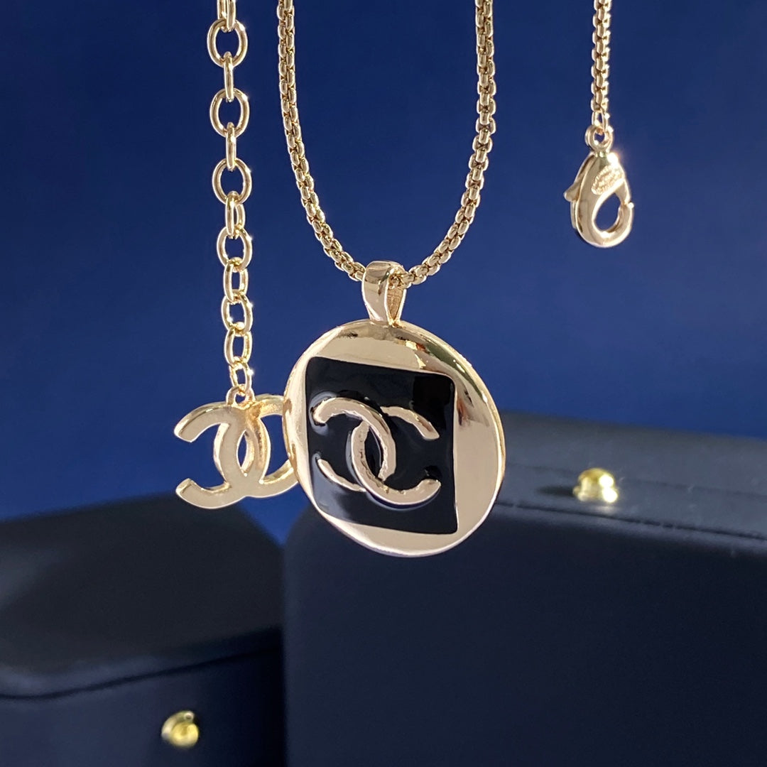 Double-C Emblem Pendant Necklace in Gold-Tone – Black Detail – Design 002 front product view