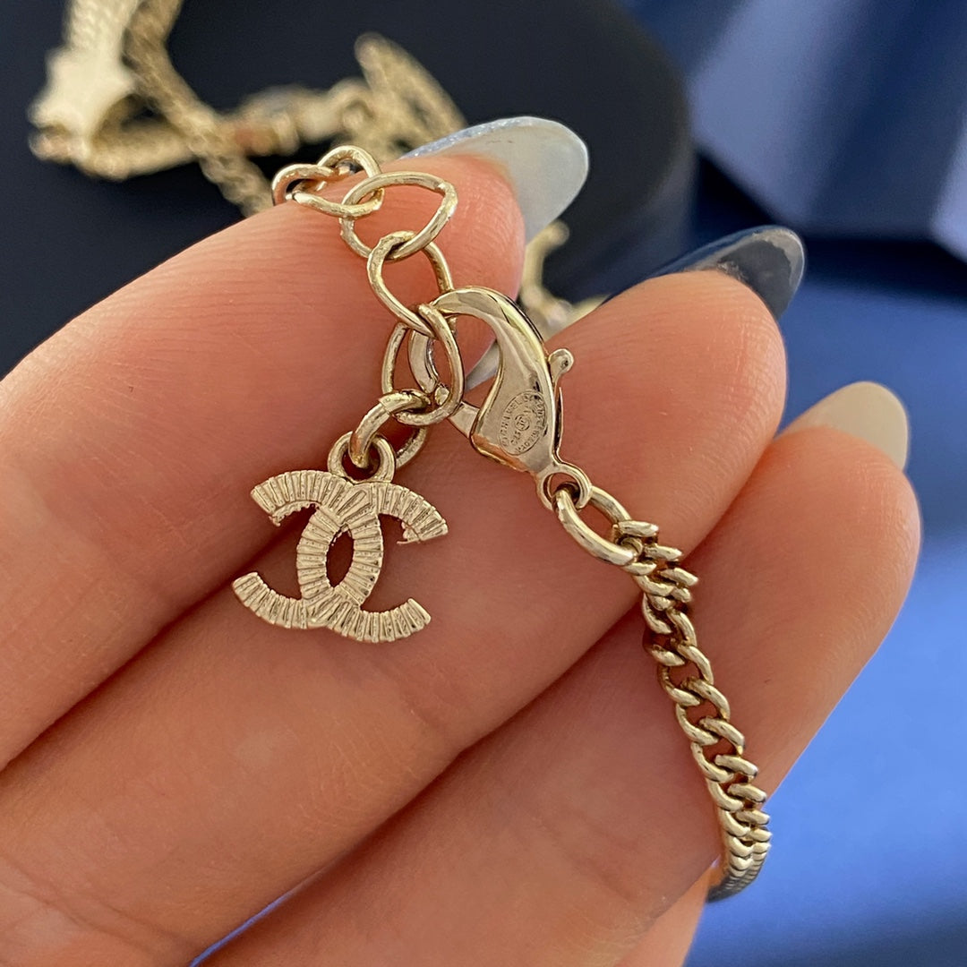 Letter Crystal-Accent Pendant Necklace – Star Detail close-up detail
