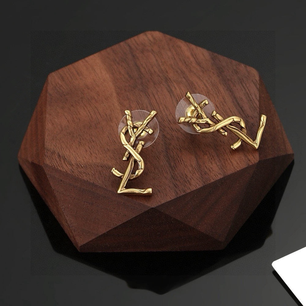 Geometric Emblem Stud Earrings in Gold-Tone – Design 011 close-up detail