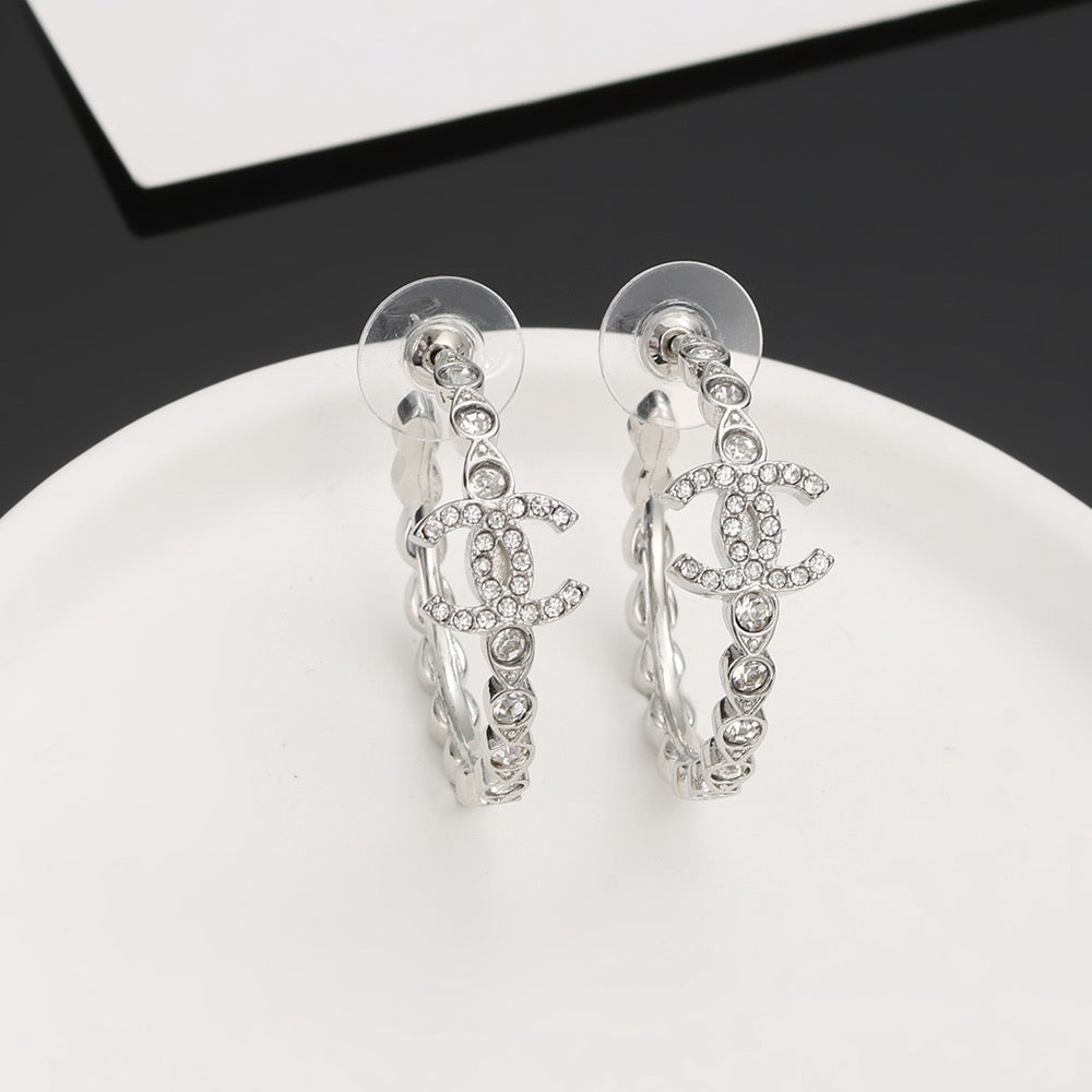 Signature Emblem Crystal-Accent Stud Earrings – Red Detail – Design 007 close-up detail
