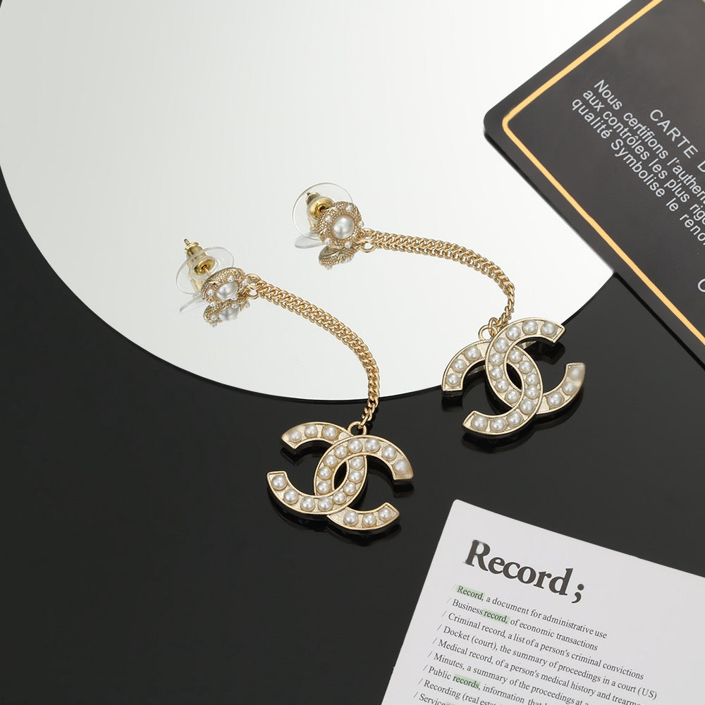 Double-C Emblem Pearl-Detail Stud Earrings – Pearl Detail – Design 023 detail view