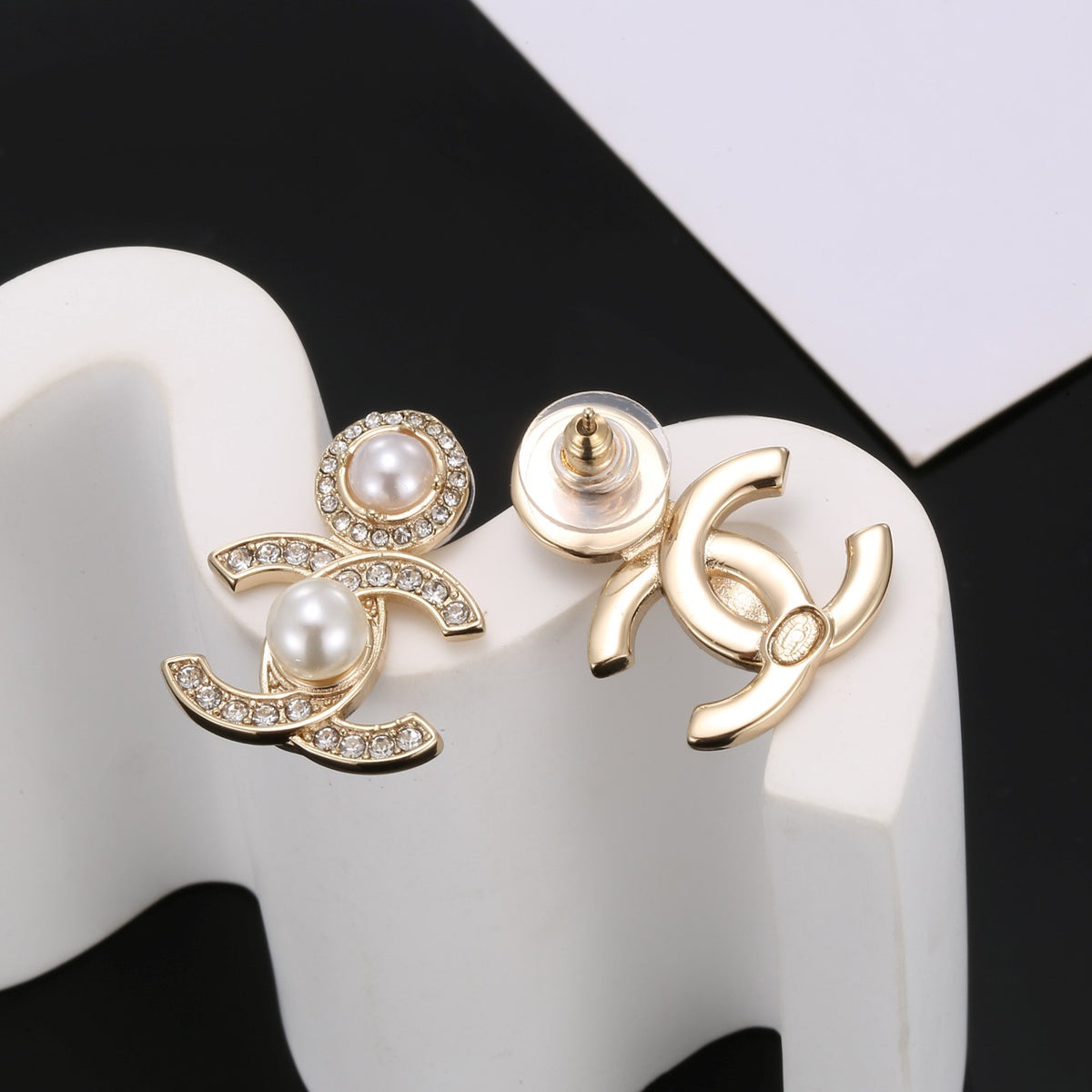 Signature Emblem Stud Earrings in Polished Metal-Tone – Design 022 detail view