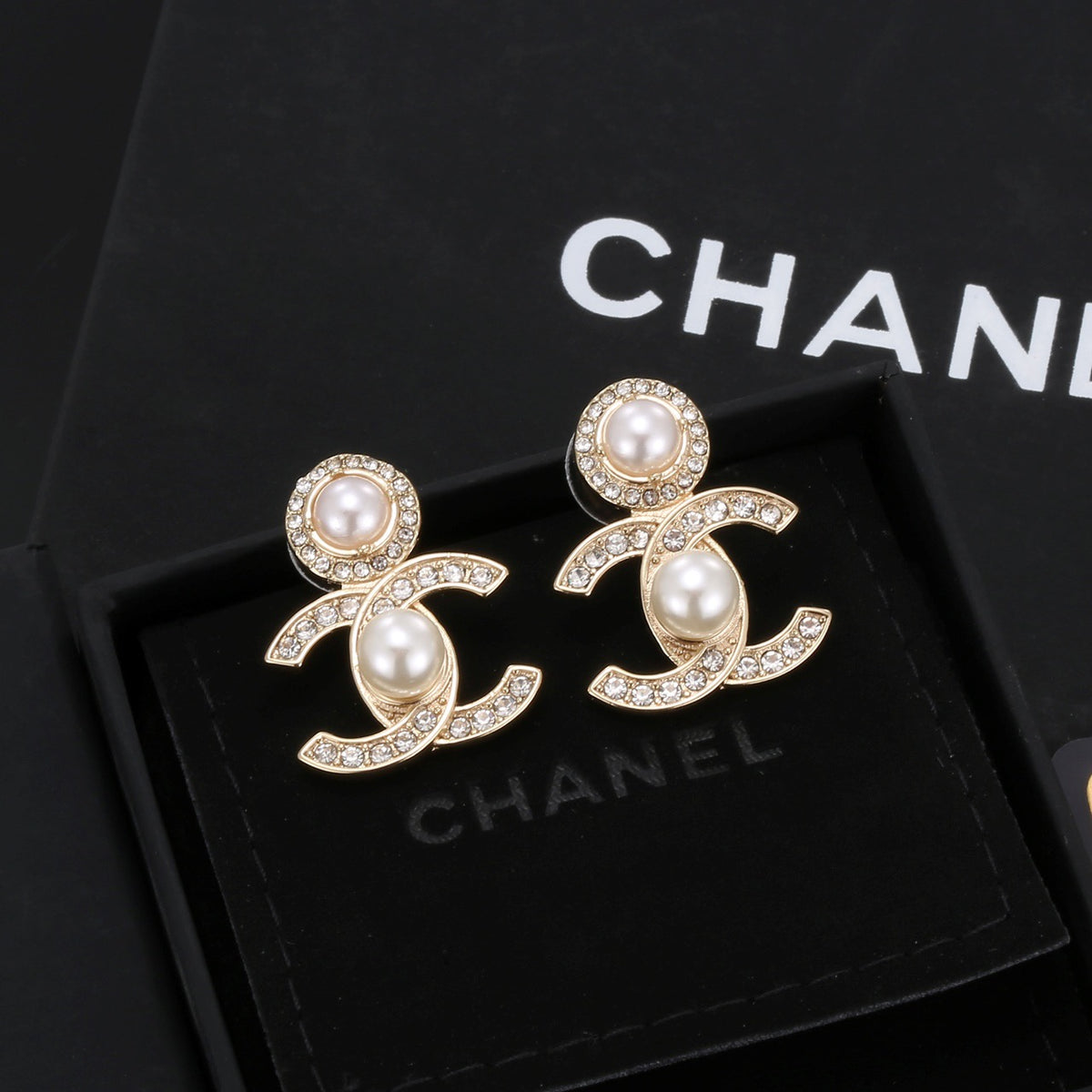 Signature Emblem Stud Earrings in Polished Metal-Tone – Design 022 front product view