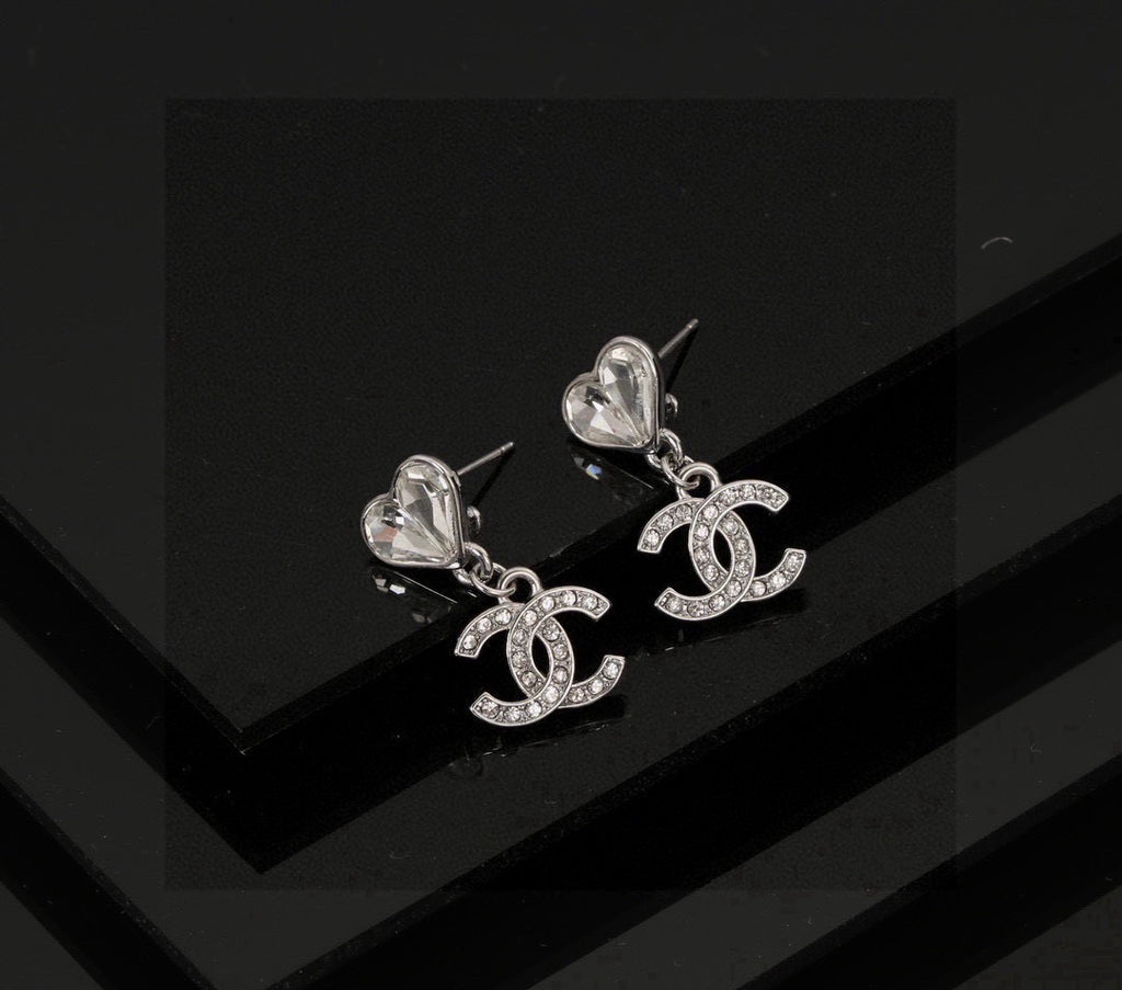 Double-C Emblem Stud Earrings in Polished Metal-Tone – Design 176 close-up detail