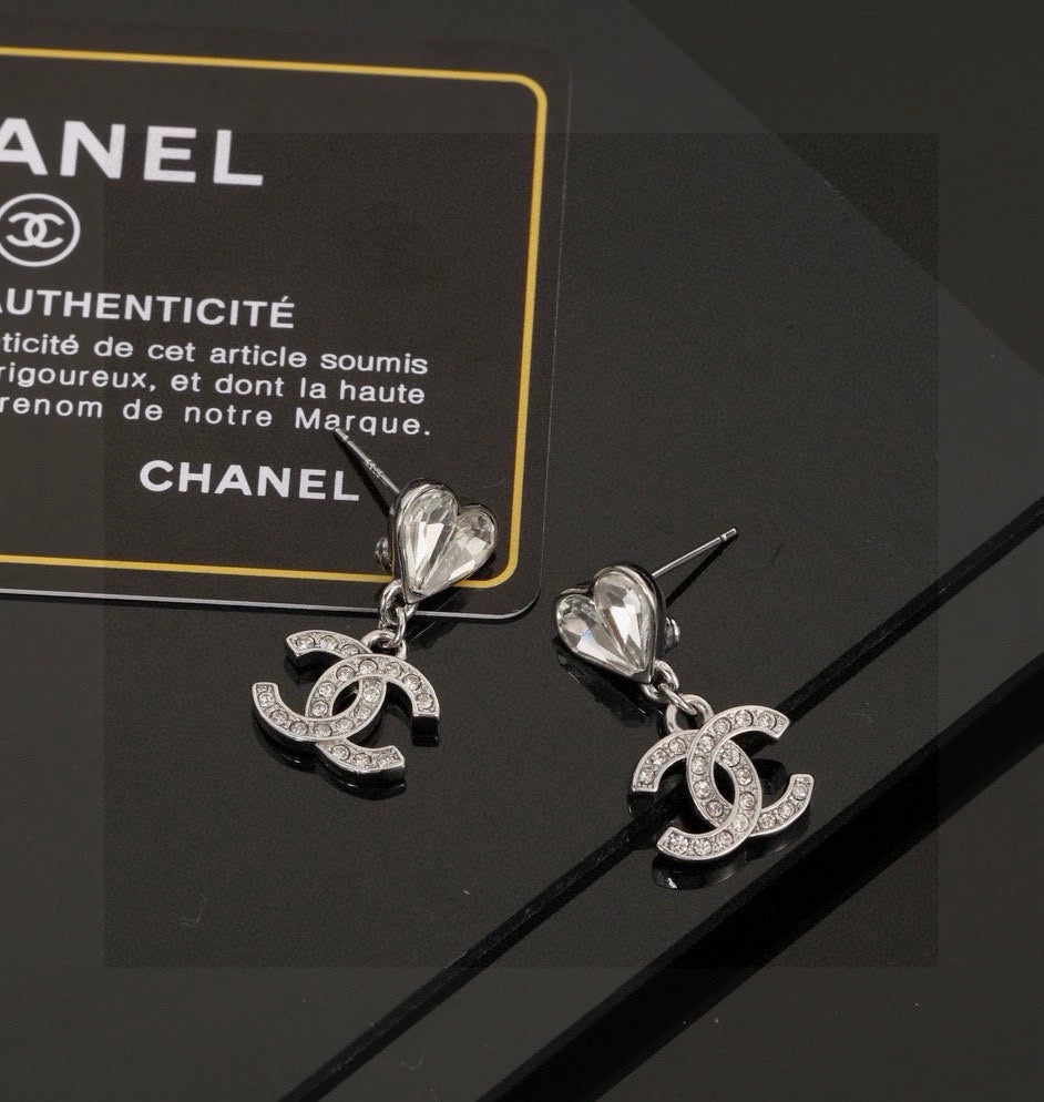 Double-C Emblem Stud Earrings in Polished Metal-Tone – Design 350 front product view