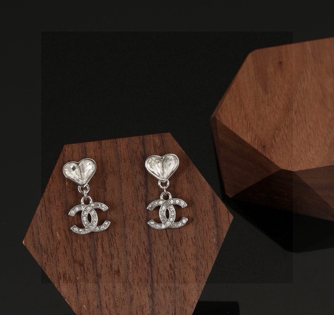 Double-C Emblem Stud Earrings in Polished Metal-Tone – Design 350 detail view