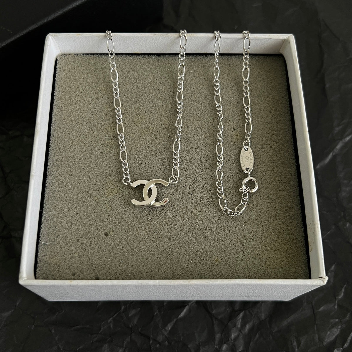 Double-C Emblem Pendant Necklace in Polished Metal-Tone – Design 066 close-up detail
